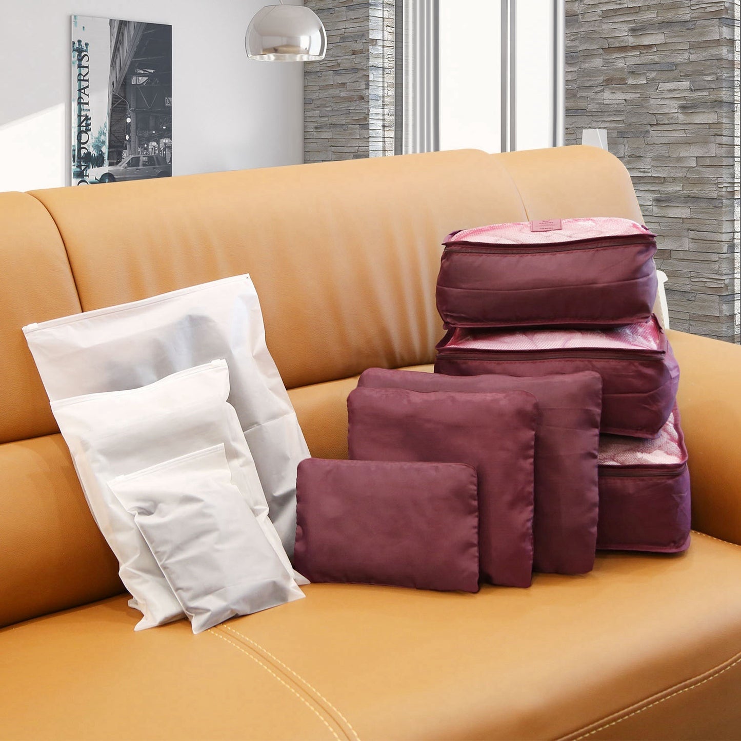 Blue 9-piece travel packing organizer set including cubes, pouches and storage bags