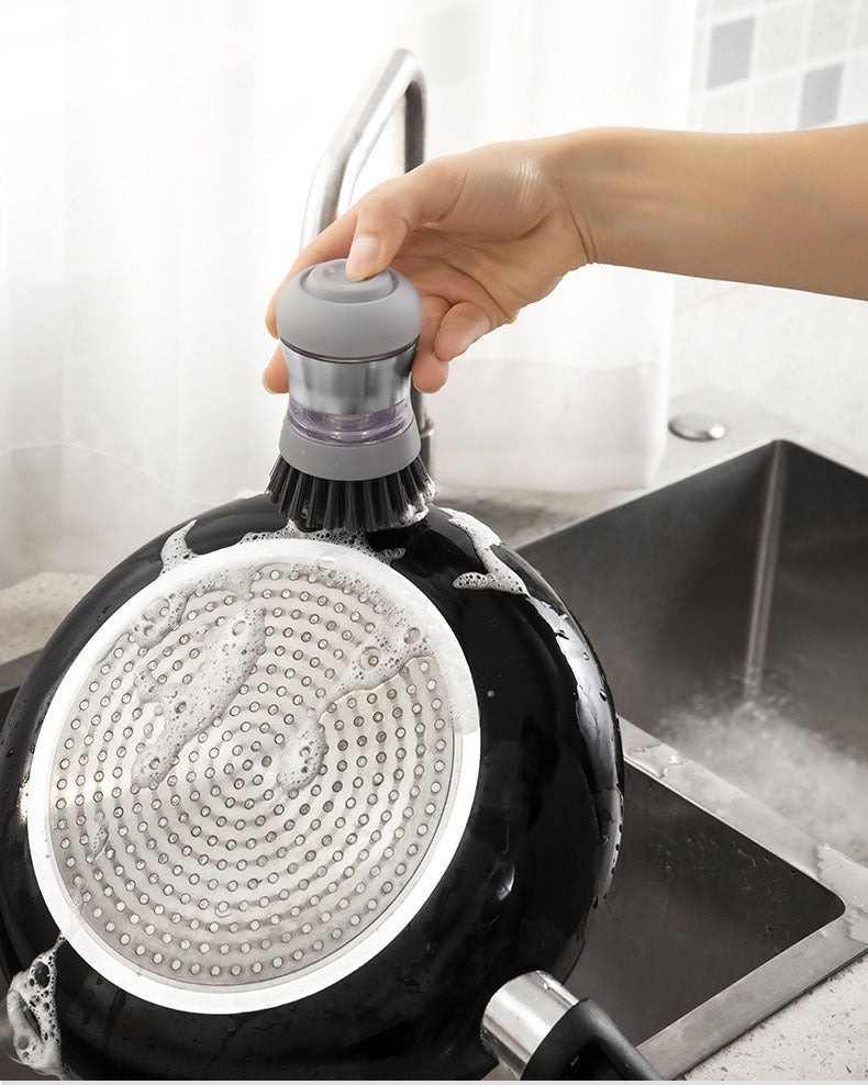 Stainless steel pot brush with non-slip grey handle for heavy-duty kitchen cleaning